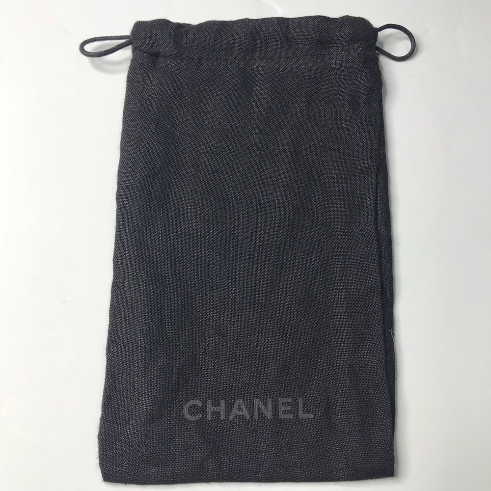 Authentic Black CHANEL dust bag.